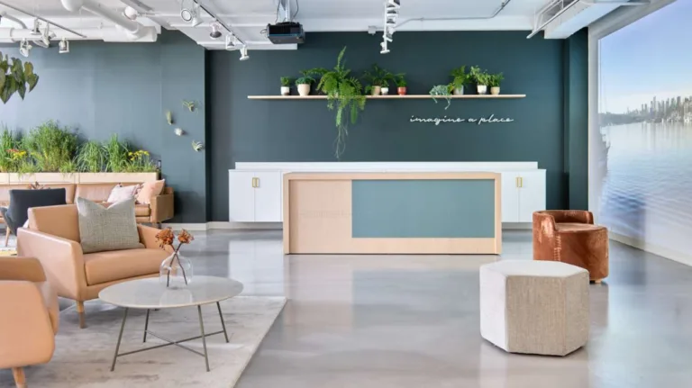 OFS Kintra Desk with Mile Marker Storage, Boost Ottomans, Evergreen Chairs, Kosa Occasional Tables